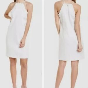 NWOT Trina Turk White textured spaghetti strap dress with ruffle top hem size 12